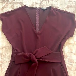 Burgandy wine colored umpsuit with tie front and zipper back